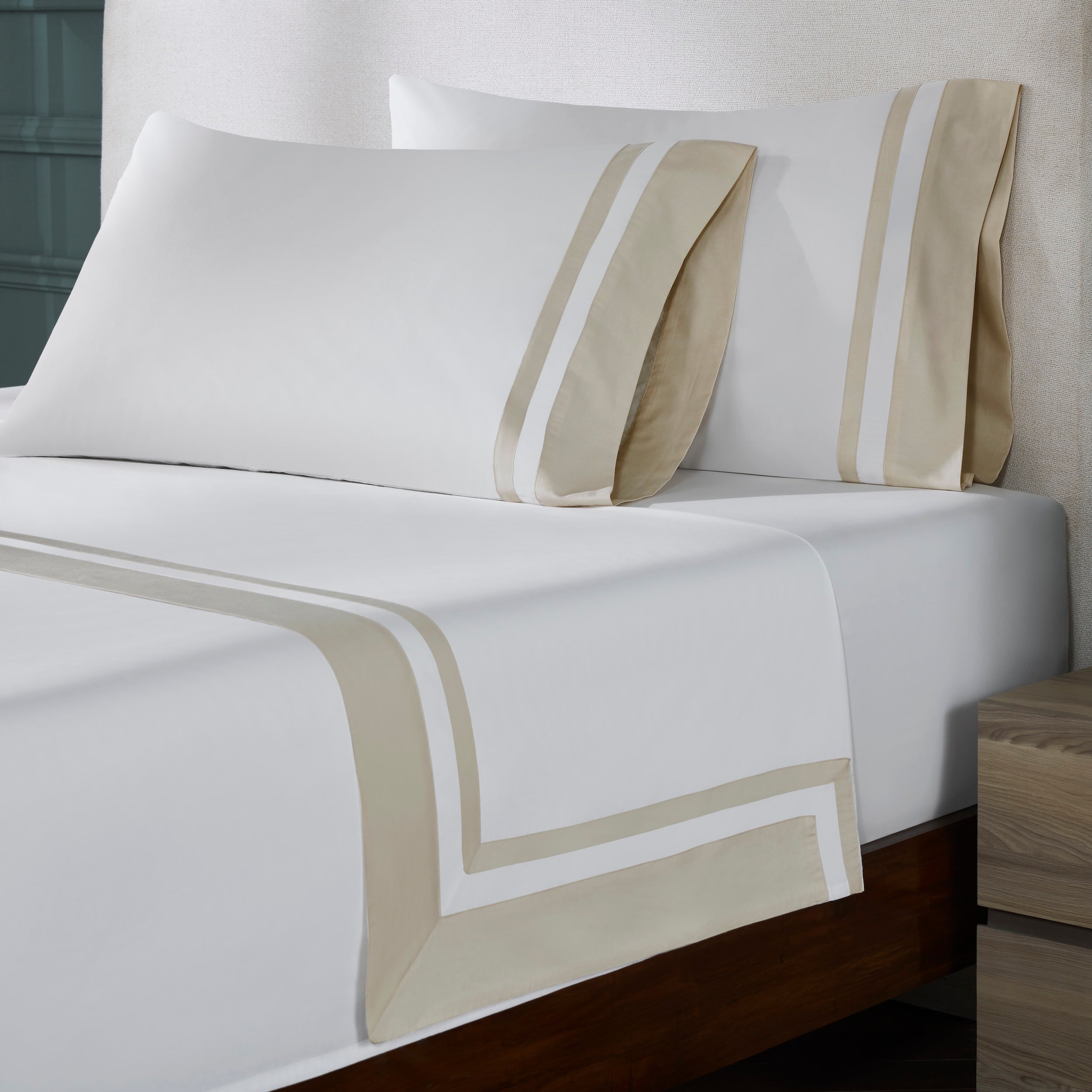 QFL-543-6080_2|Elegant 100% cotton sheets set in white with beige striped trim, showing detailed corner on a luxurious bed. Soft & breathable.