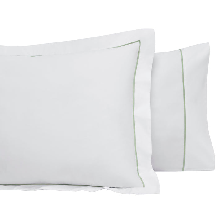 AKP-532-2040_3|Elegant white 100% cotton pillowcases with stylish light green border details, adding comfort and modern touch to bedding.