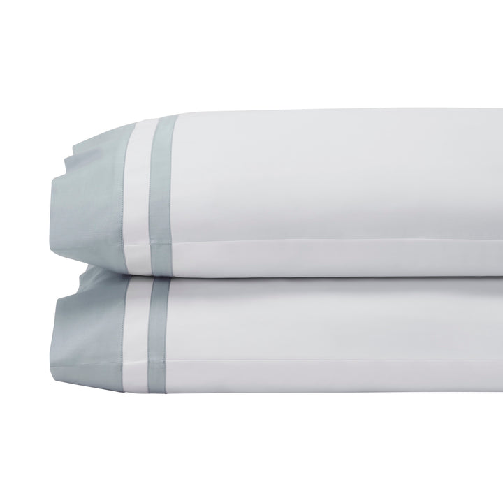 ASP-541-2032_1|Stacked pair of standard 100% cotton sateen pillowcases in white with a wide light blue border and two white stripes.