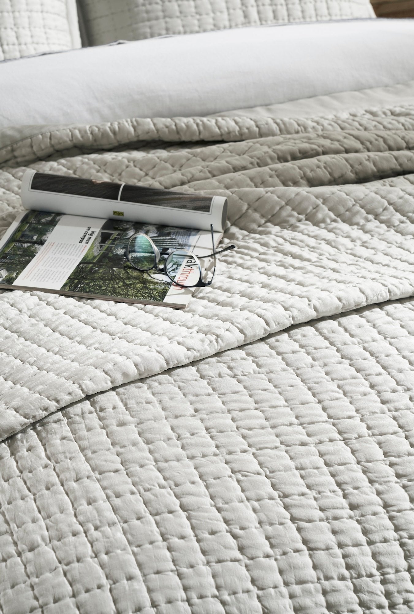 CL-198-11096_4|Close-up of a light grey coverlet showcasing its intricate grid-stitched texture, perfect for modern and cozy bedroom styling.