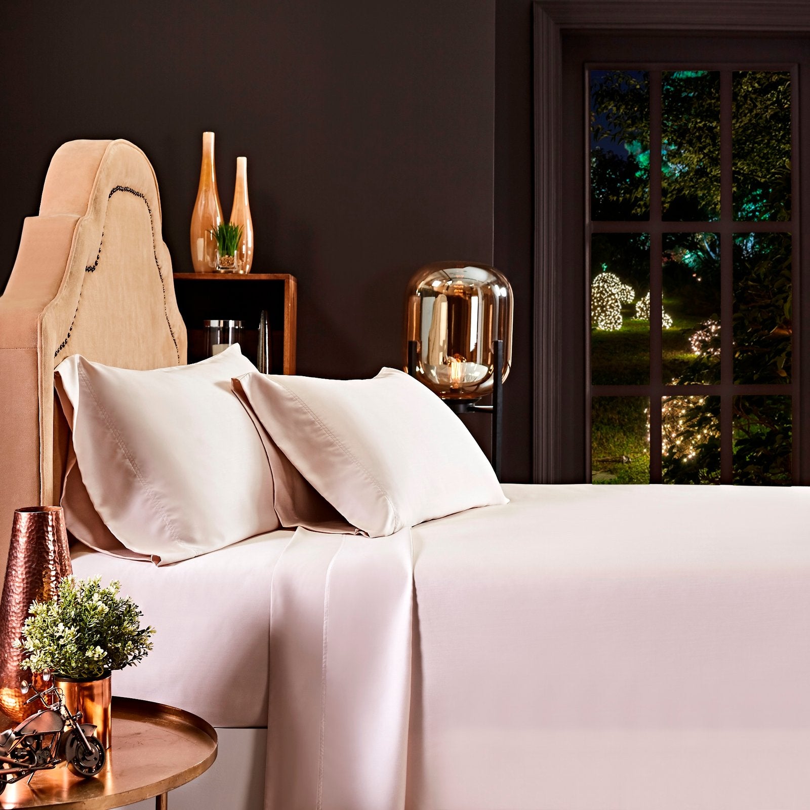 CSS-510-7284_1|Luxurious light pink 100% Lyocell sheets, providing silky soft comfort and breathable elegance for any bedroom.