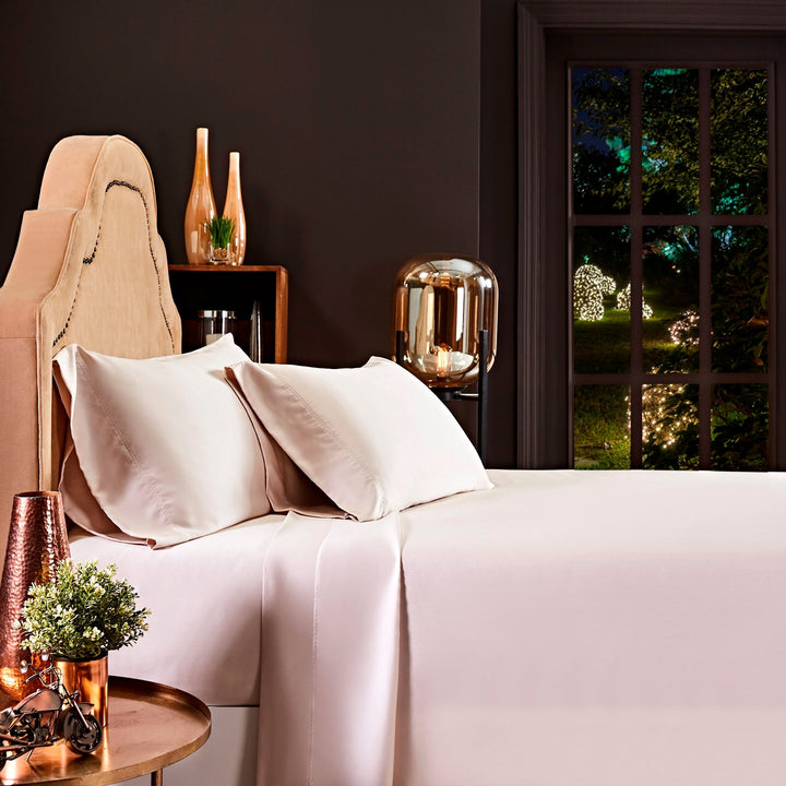 CSS-510-7284_1|Luxurious light pink 100% Lyocell sheets, providing silky soft comfort and breathable elegance for any bedroom.