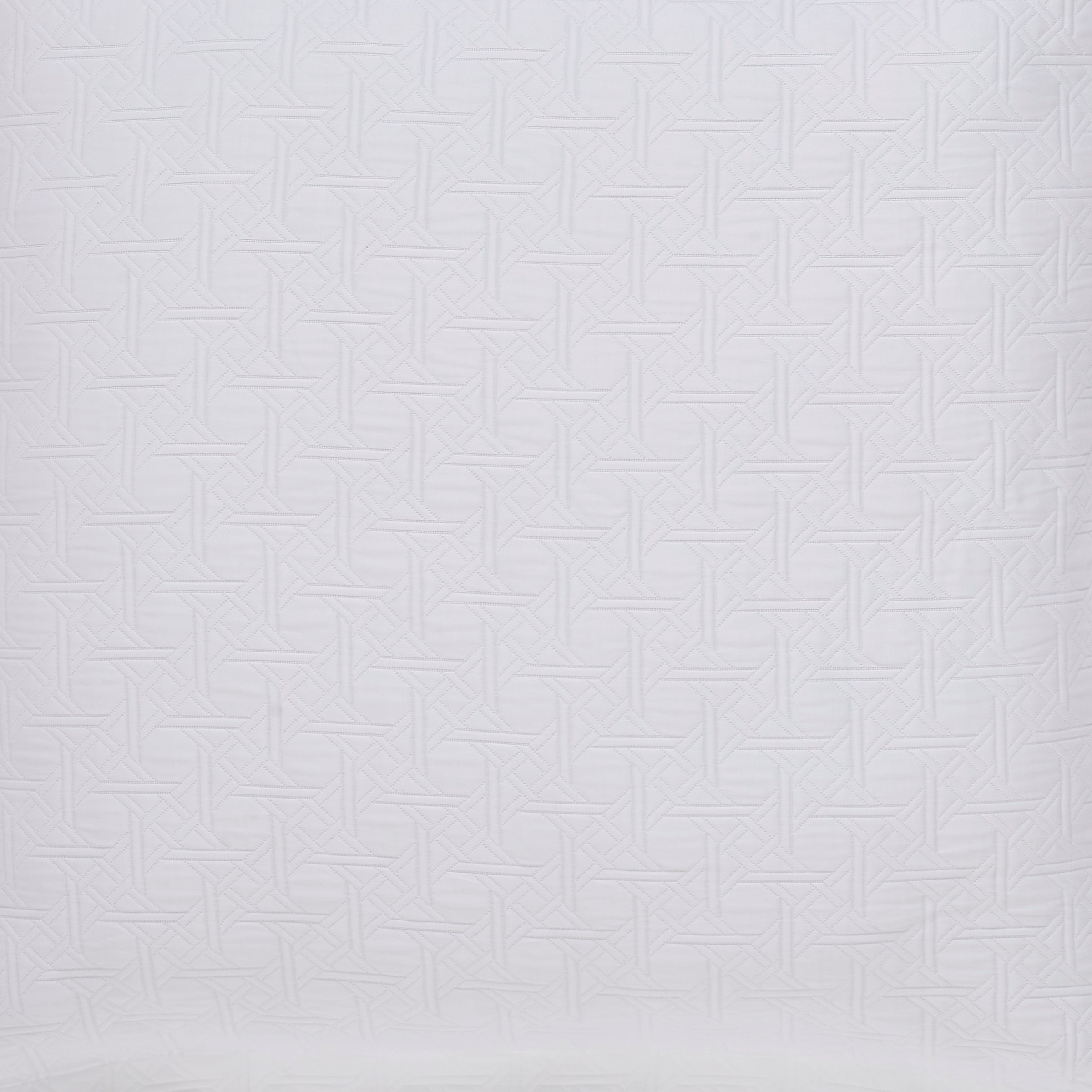 ES-175-2626_2|Detail of white geometric quilted coverlet. Elegant, intricate bedding for a stylish and contemporary bedroom look.