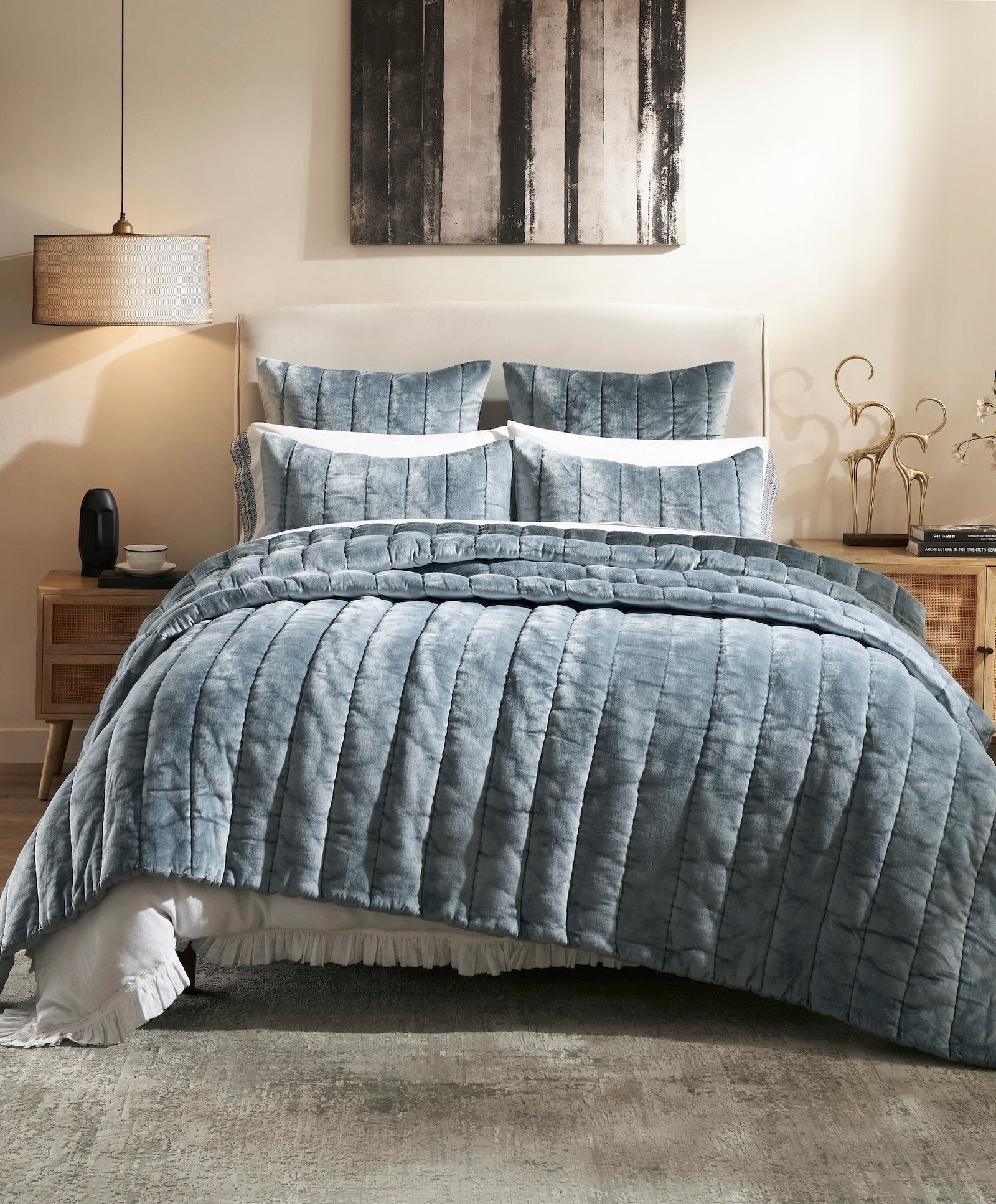 QT-360-11096_1|Luxurious blue velvet-like quilted bedspread, adding plush comfort and a rich, elegant touch to a modern bedroom.