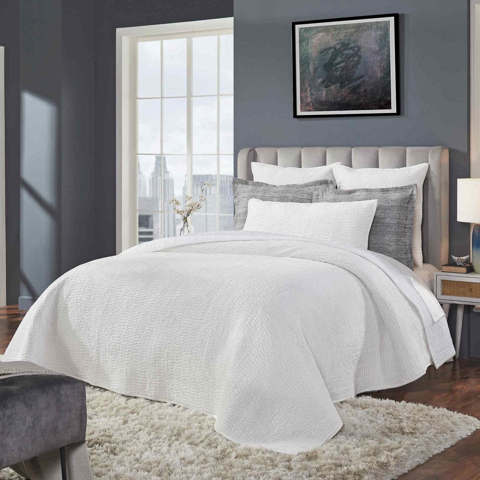 CL-182-9496_3|White textured coverlet on a queen bed, elegant quilted bedding for a serene and luxurious sleep space. (119 chars)