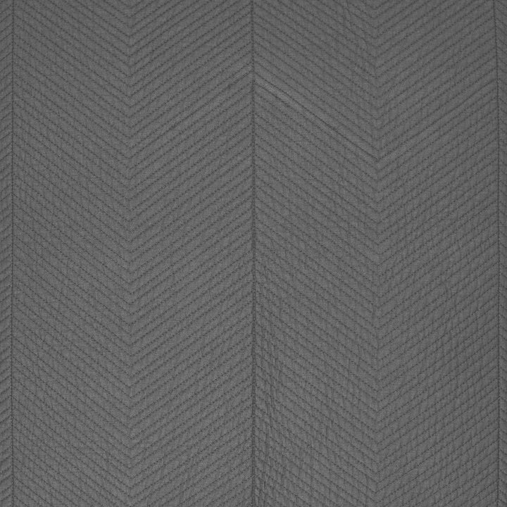 SS-263-2026_2|Dark grey quilted coverlet with a prominent chevron pattern. Modern, cozy bedding texture for a stylish bedroom.