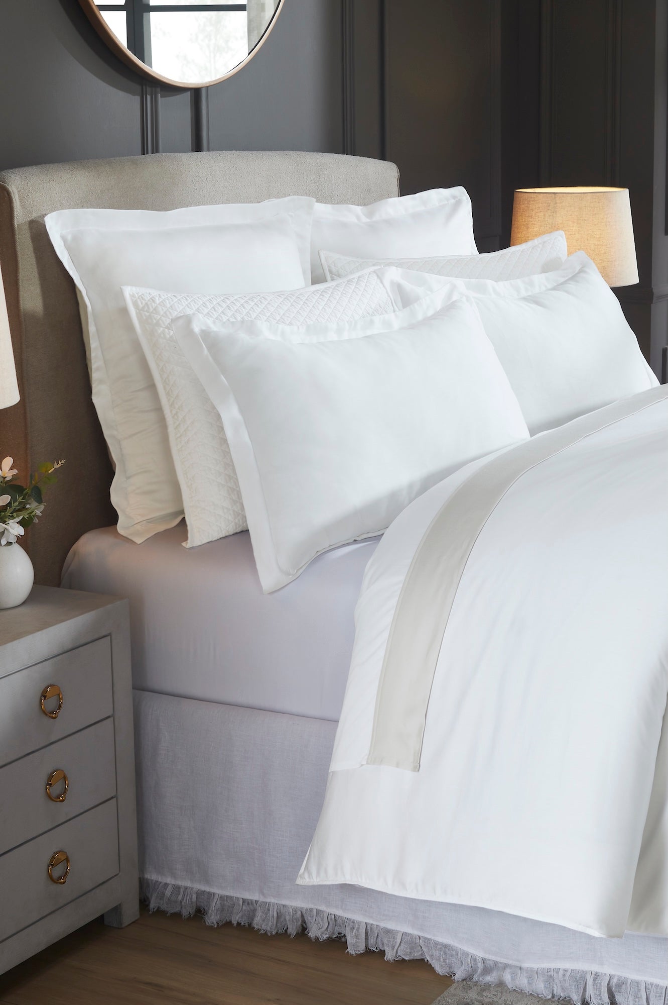 DT-045-9092_3|Close-up of a crisp white luxury cotton duvet cover, featuring subtle detailing, adding serene comfort to a modern bedroom.
