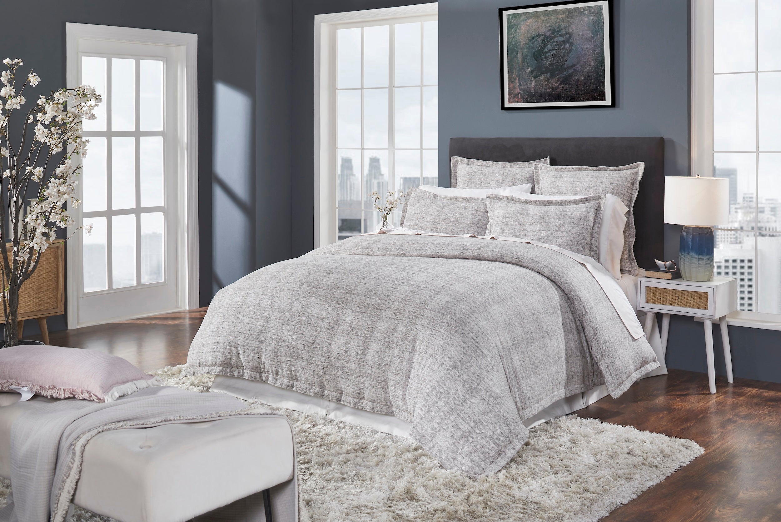 DT-032-10692_2|Contemporary light grey textured duvet cover set on a king-size bed, providing warmth and sophisticated bedroom style.