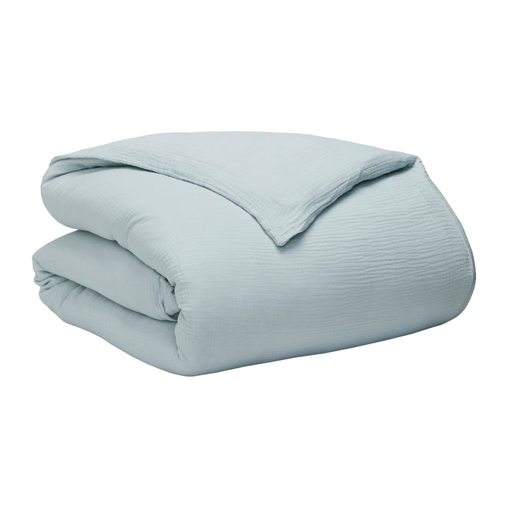 DT-050-9092_8|Soft light blue crinkled cotton duvet cover, folded neatly. Perfect for cozy, comfortable, and organic bedding options.