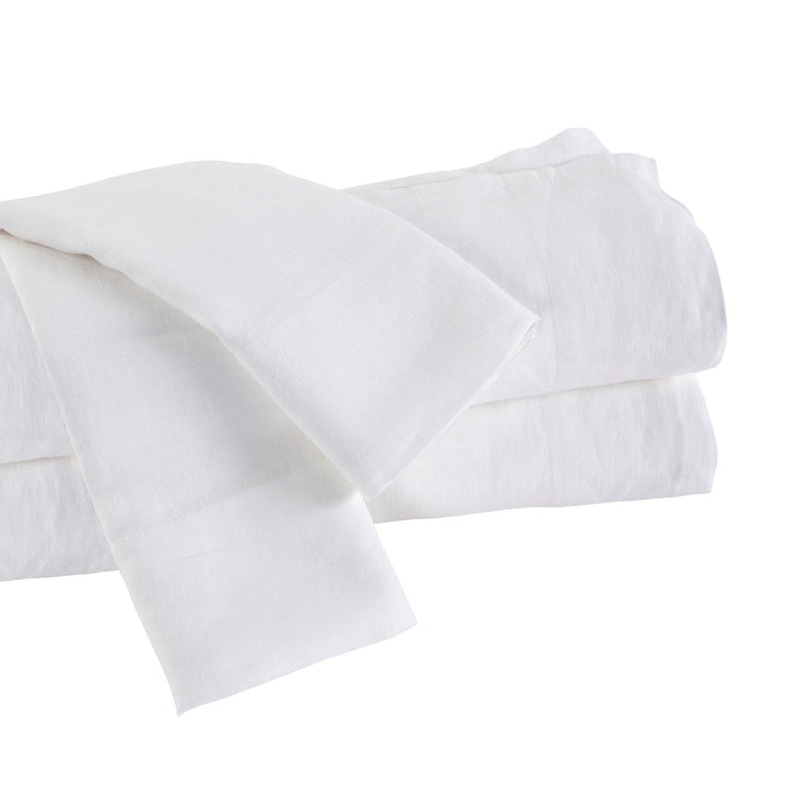 KSS-514-7880_5|Neatly folded white 100% pure linen sheet set, highlighting the crispness and quality of natural, breathable bedding.