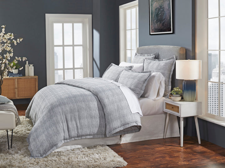 DT-035-9092_2|Inviting gray textured duvet cover set and matching shams, creating a cozy and stylish contemporary bedroom scene.