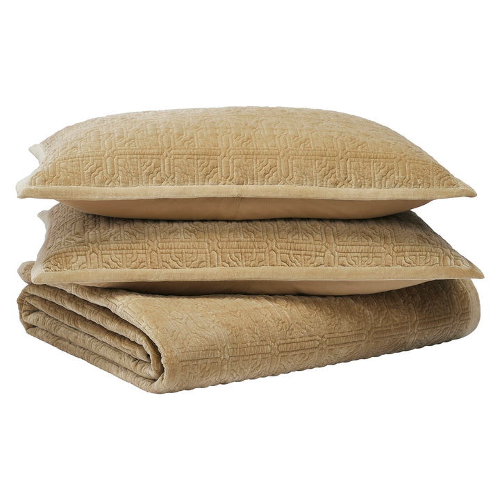 KS-377-2036_4|Stack of luxurious tan velvet quilted pillows and folded quilt, featuring intricate geometric patterns, soft and cozy.